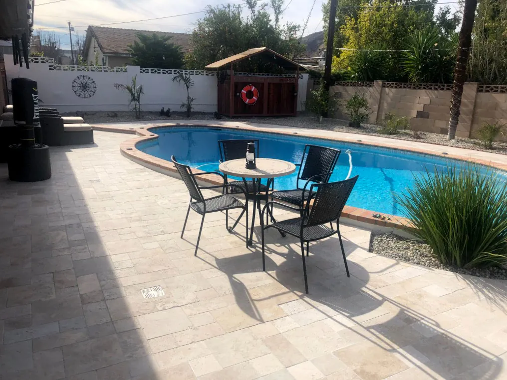 Travertine pool deck and patio