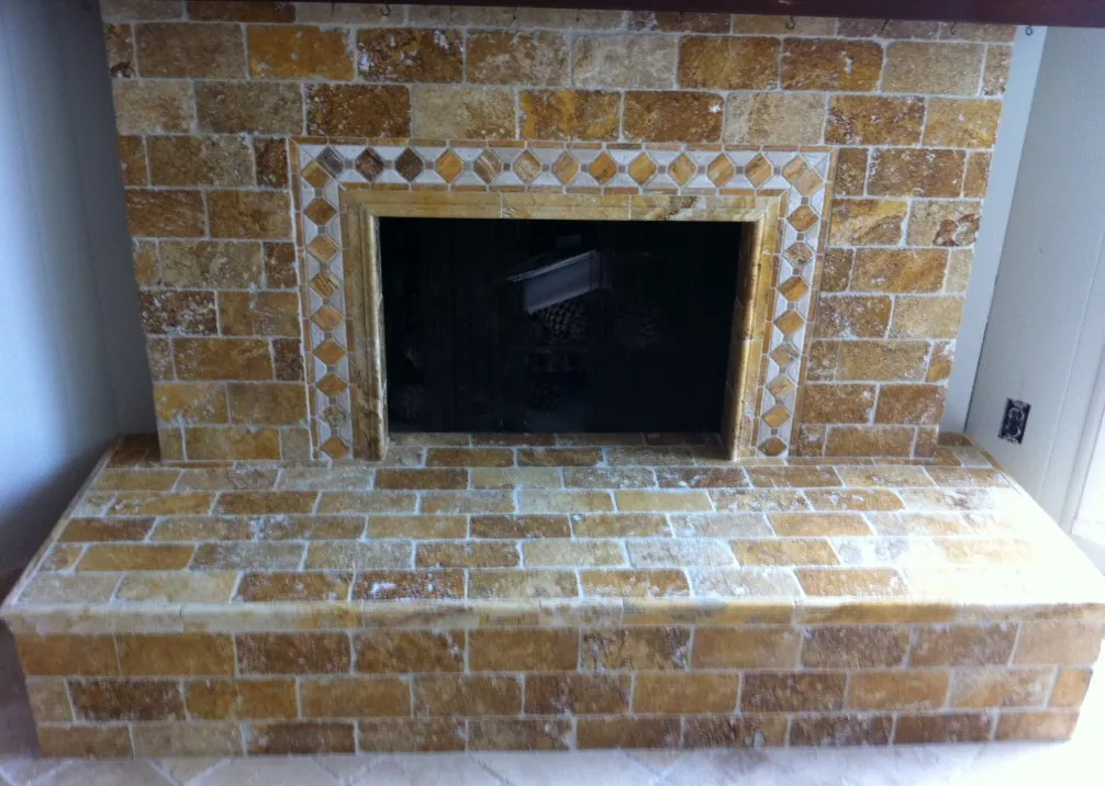 Tumbled travertine fireplace surround and hearth